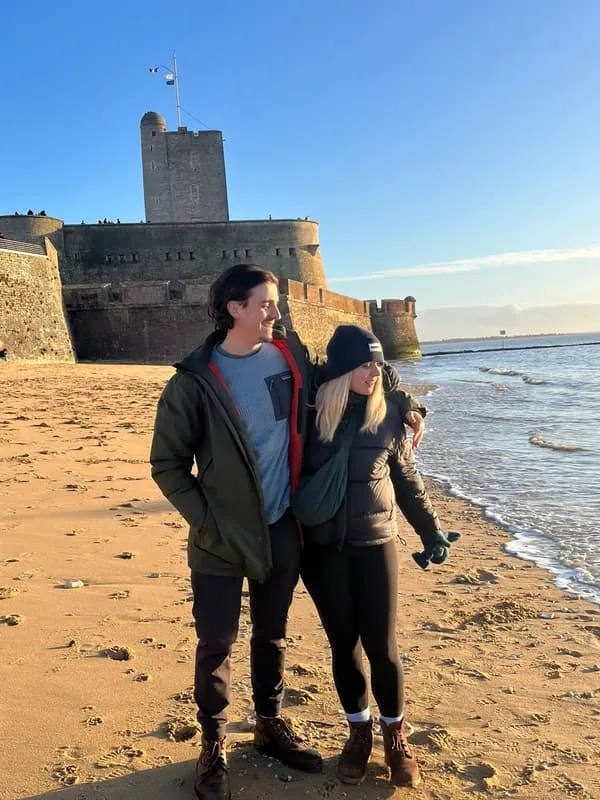 Tess and Jonny in hats and coats, Fouras in winter